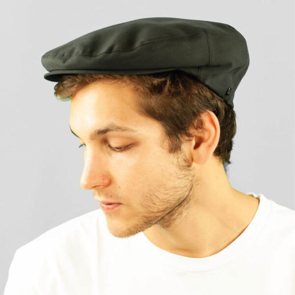Drip-proof and wind-proof fabric hat with goose-down lining