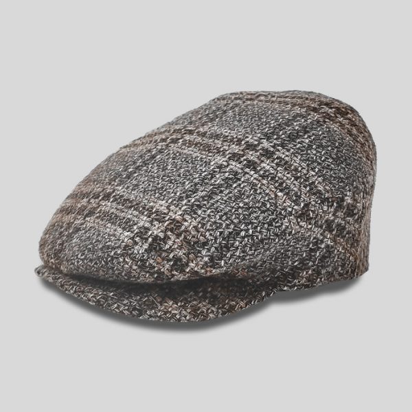 Flat cap in tweed fabric